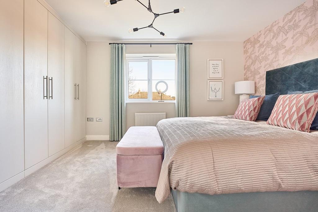 Bedroom 1 with space for wardrobes and an ottoman