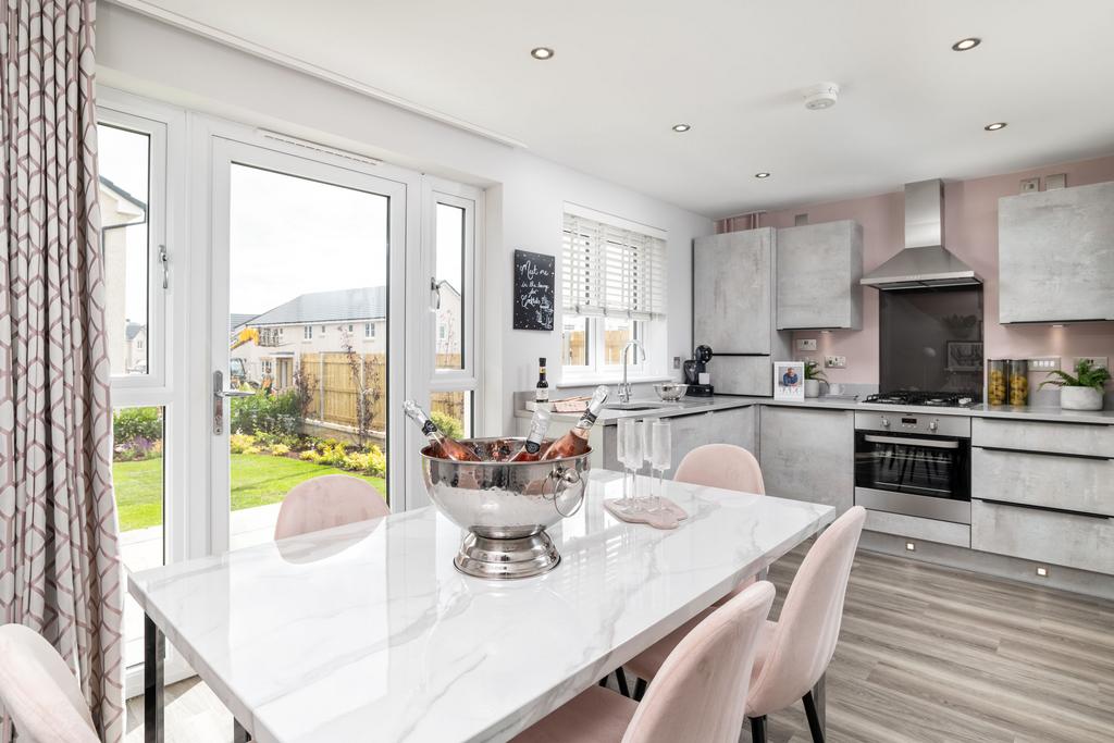 Kitchen and dining room in three bedroom home