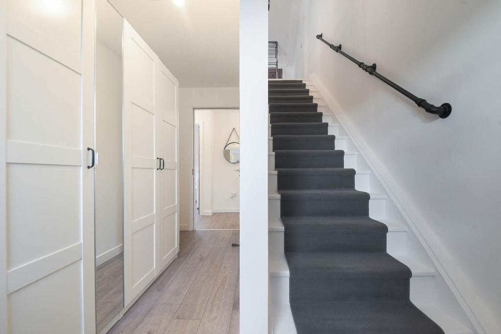 Bedroom 3/Stairs to Attic