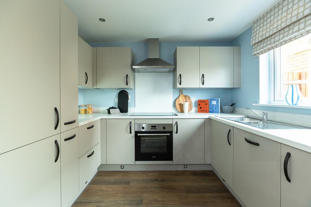 The modern kitchen offers ample storage space