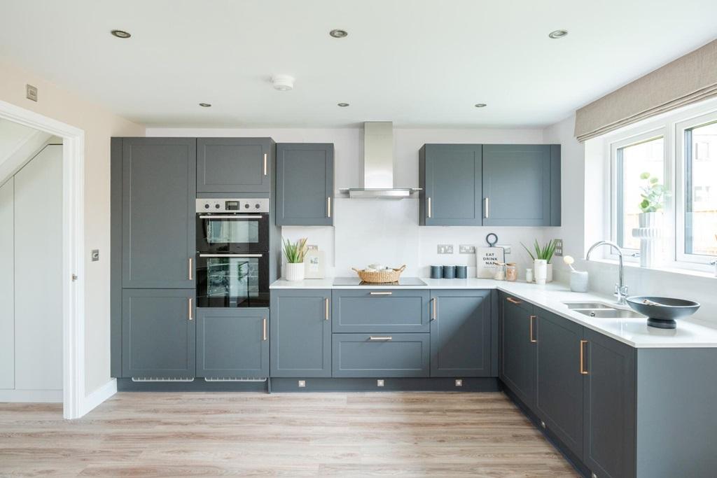 There&#39;s ample storage and worktop space in the...