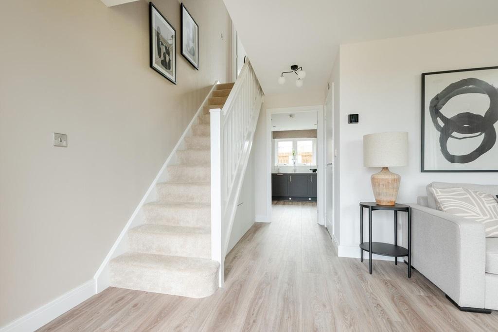 The entrance hall is flooded with natural light...