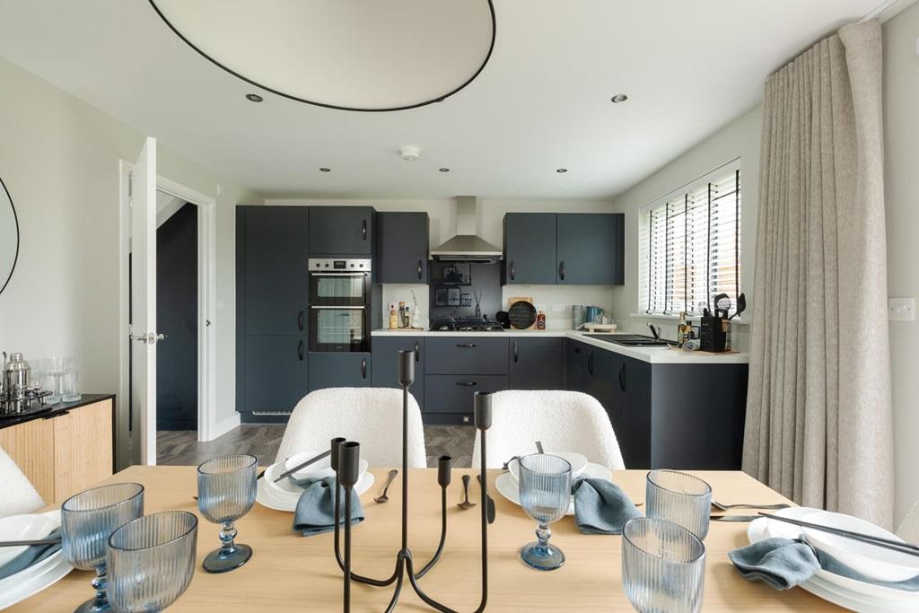 The open plan kitchen/dining area is the hub of...