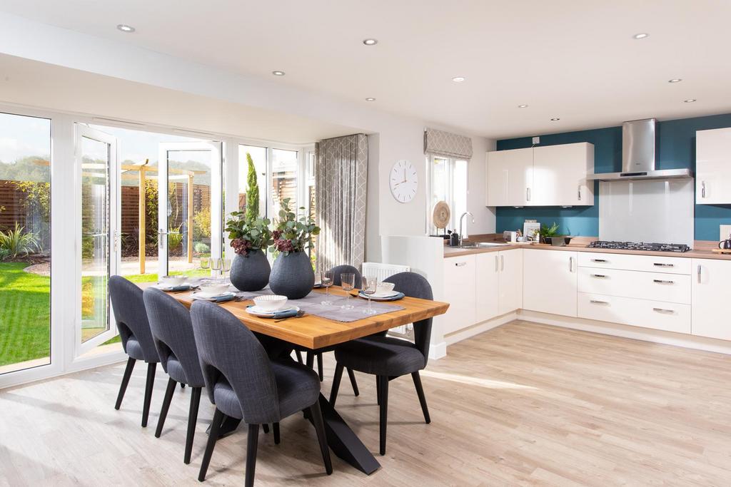 Open plan kitchen with dining area and glazed bay