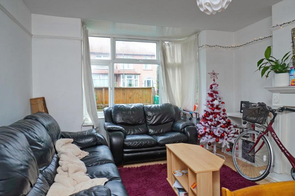 A bright and inviting living room with comforta...