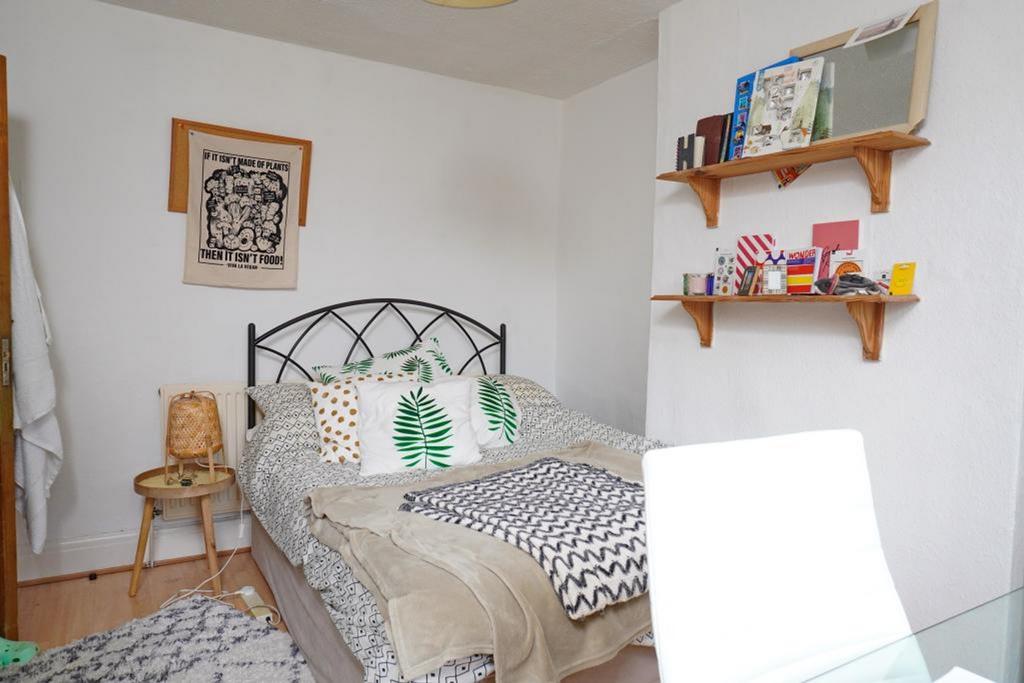 A cozy and inviting double bedroom with stylish...