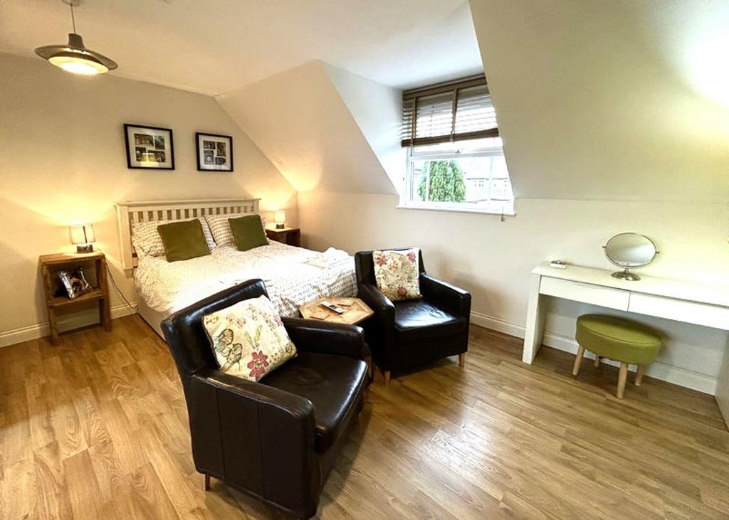 A spacious and inviting large double bedroom, p...