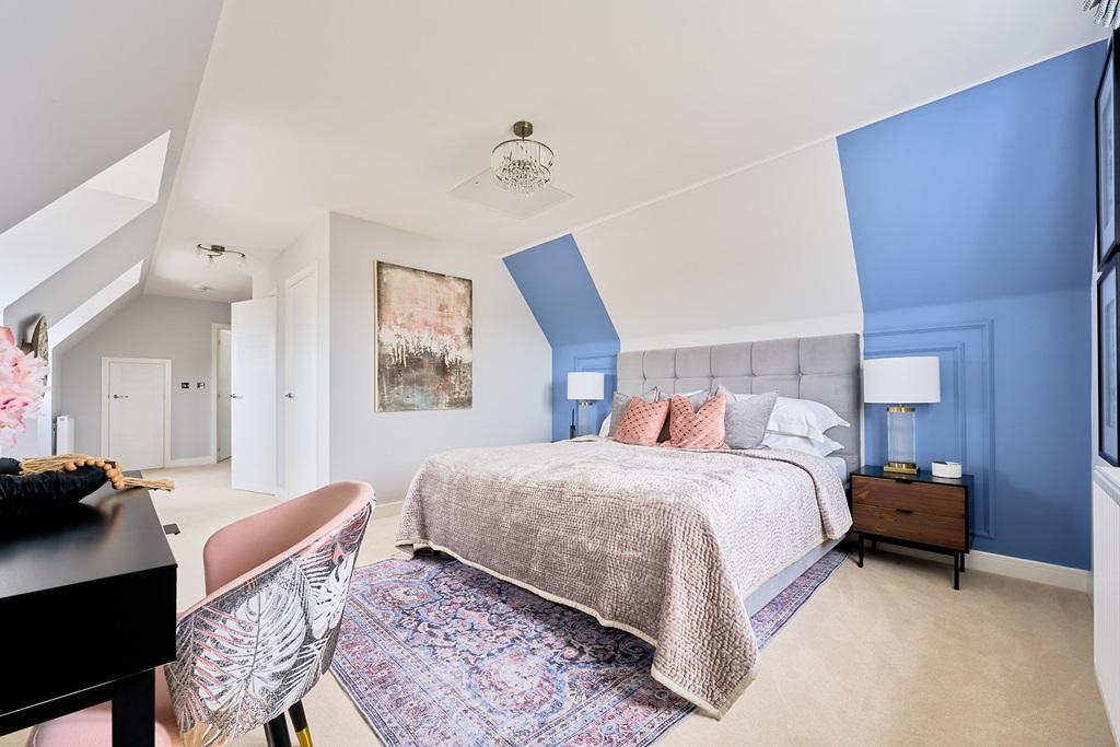 Primary bedroom with en suite and dressing area