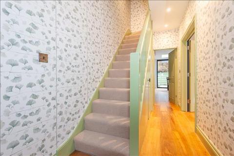7 Mill Road, London, SW19 2NE