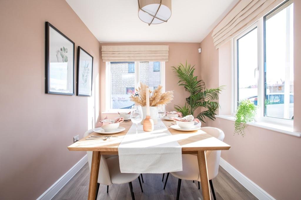The dining area is a bright sociable space to...