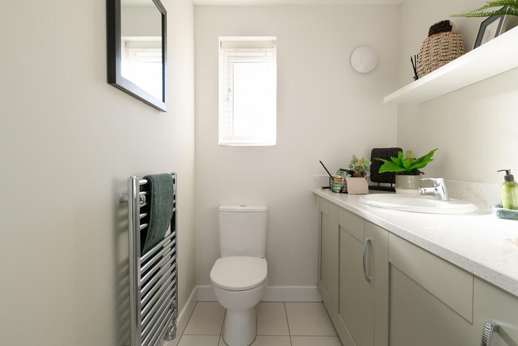 A cloakroom/utility room keeps your laundry out...