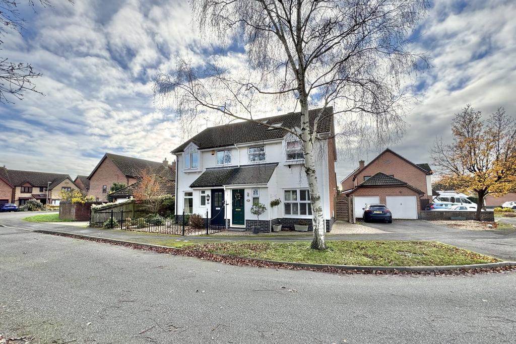 House to left, garage to right