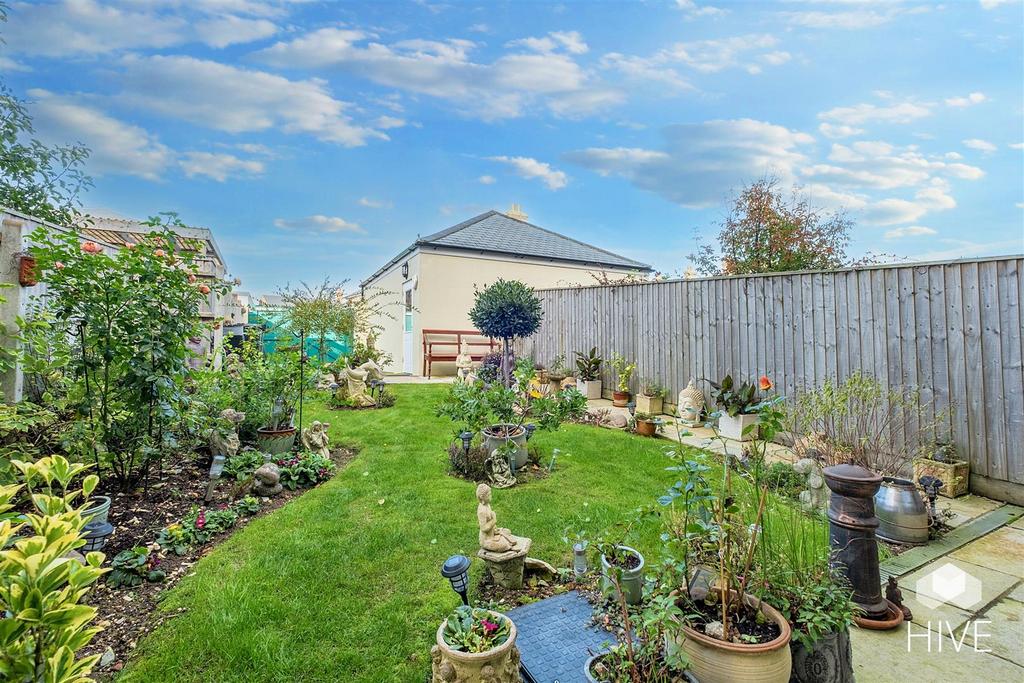 Established garden with garage and parking