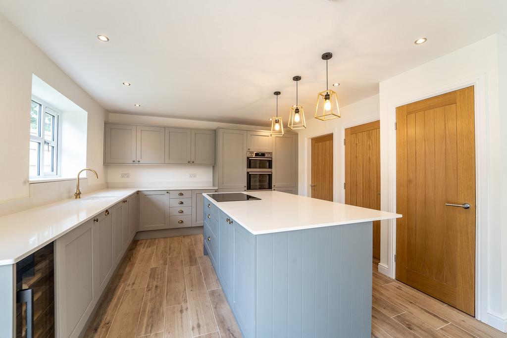 Luxury kitchen with wine cooler and island