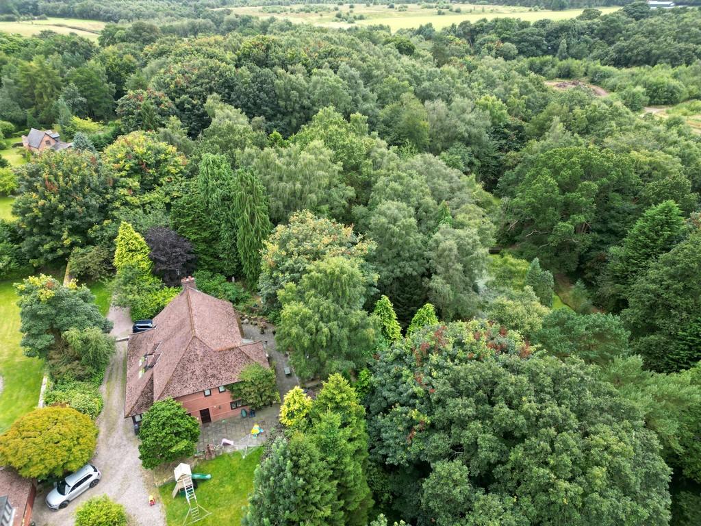 The main residence with the annexe to the lower le