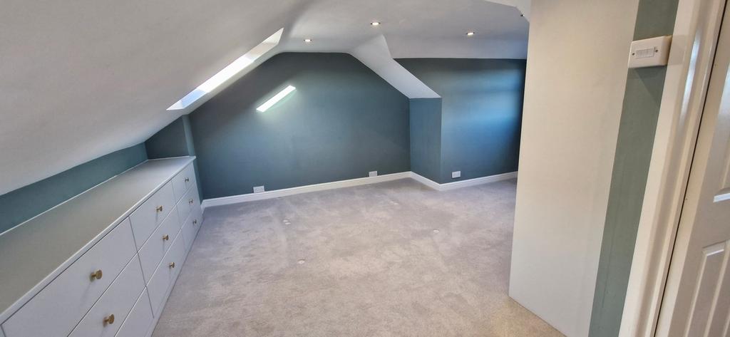 A spacious and bright large double bedroom with...