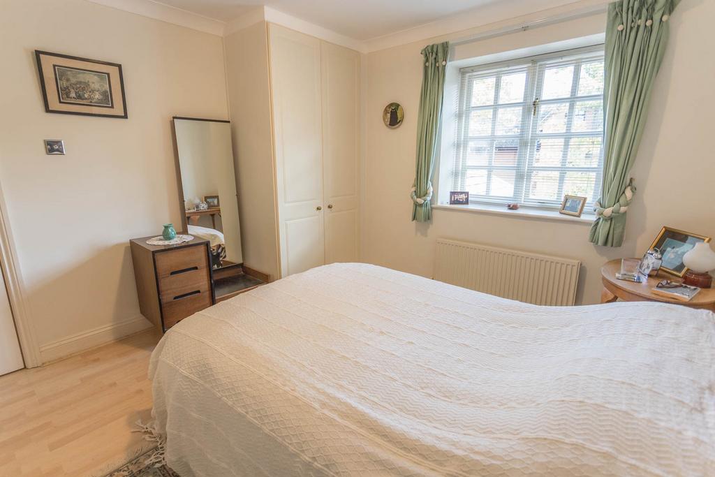Bedroom 2 with wardrobes