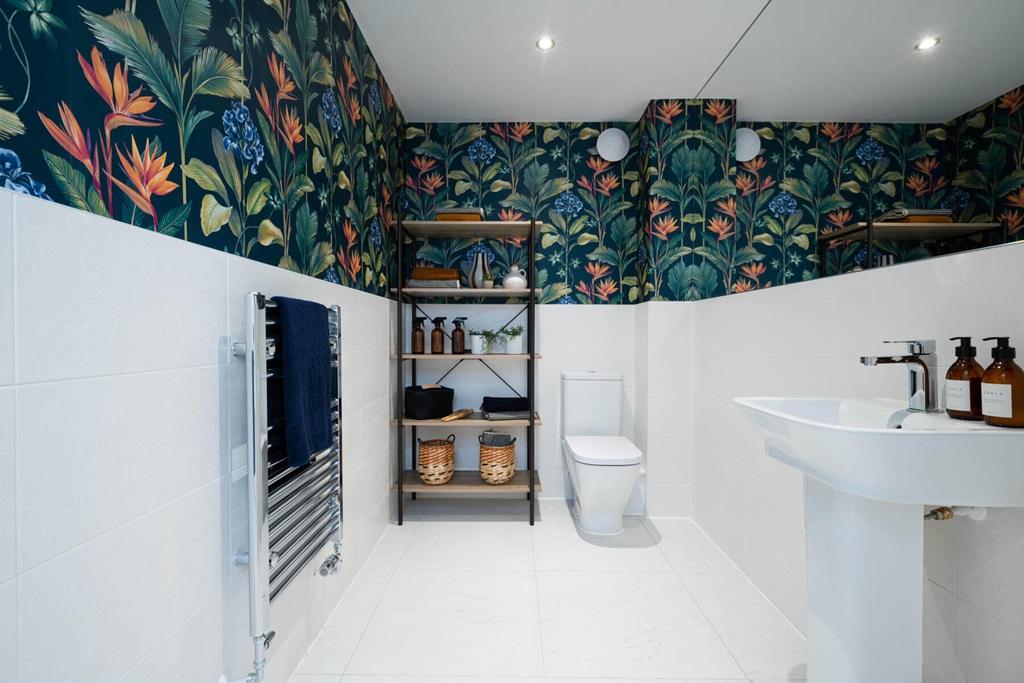 A guest cloakroom offers space for laundry...