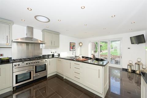 Summerland, 123 Great Tattenhams, Epsom, KT18 5RB