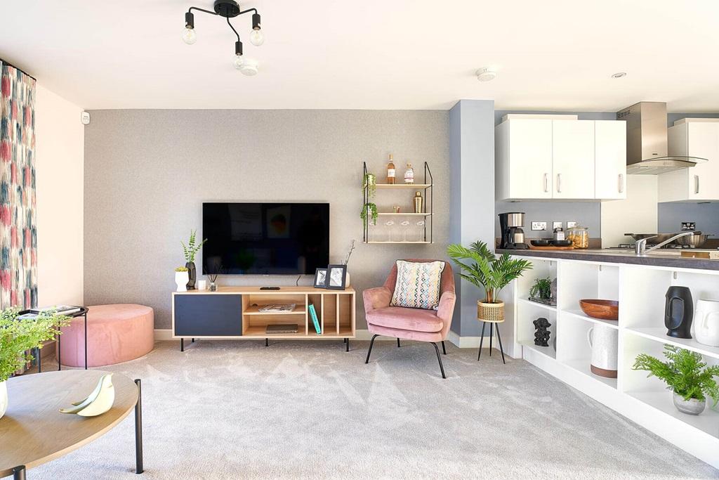 An open plan kitchen, dining and lounge area is...