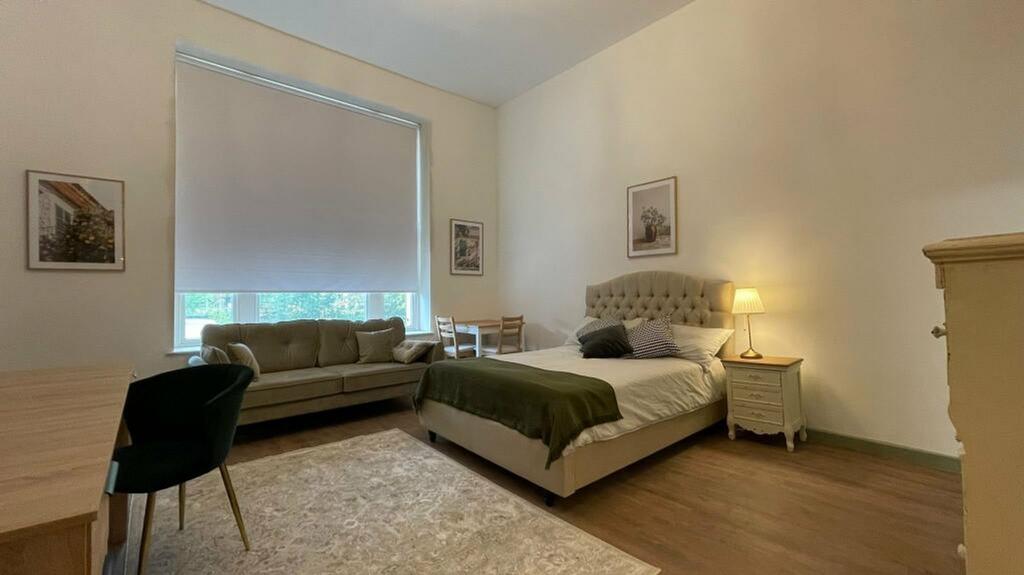 A spacious and inviting large double bedroom, f...