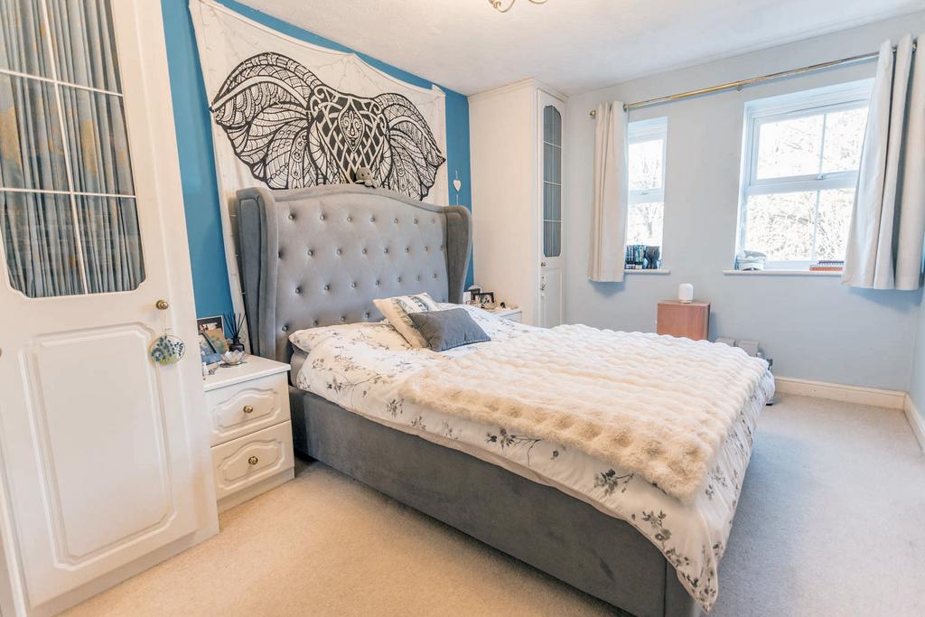 Bedroom 2 with wardrobes