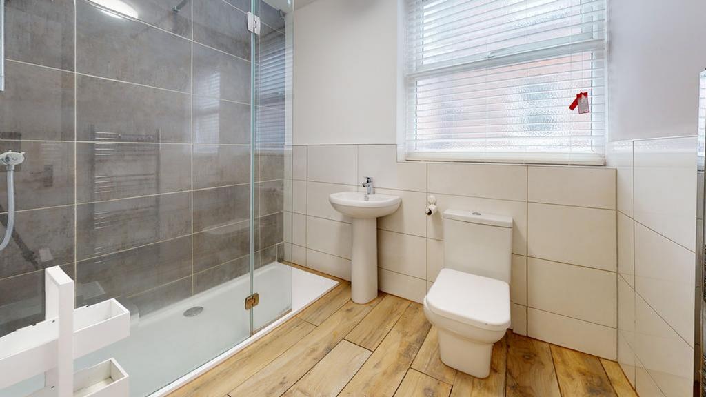 A modern and well-maintained bathroom featuring...