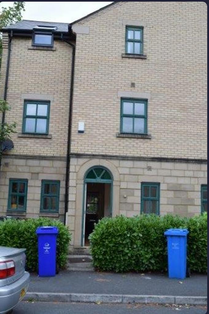 A charming exterior view of the property, featu...