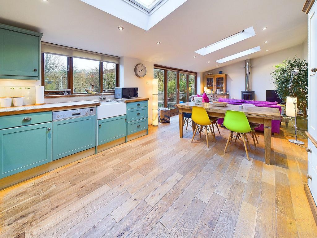 Open plan kitchen, dining, living room.