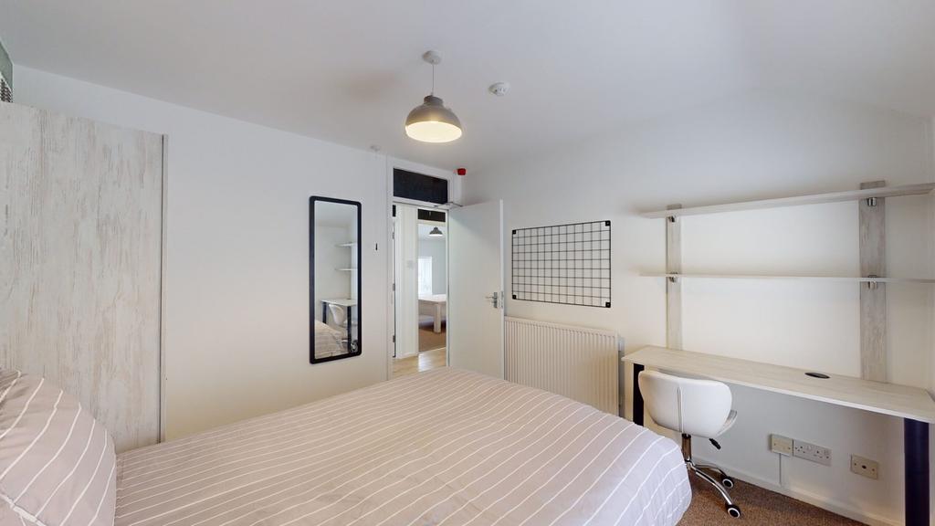 A modern and inviting double bedroom, perfect f...