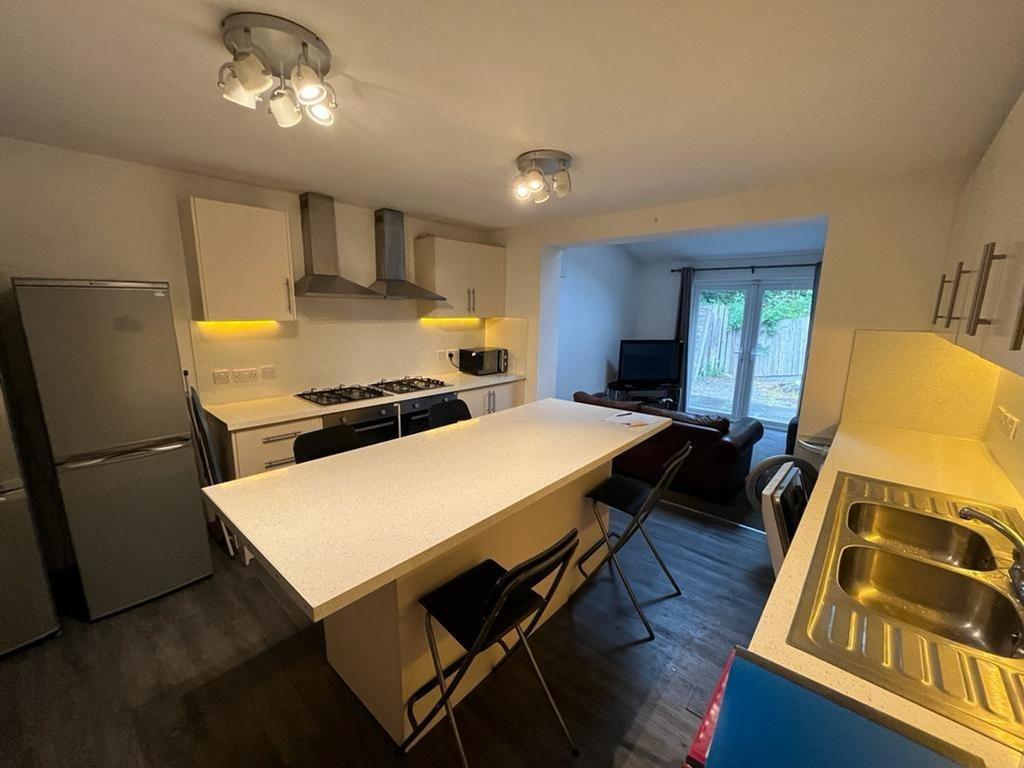 A spacious and modern kitchen area, perfect for...