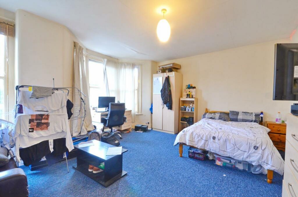 A spacious and bright double bedroom, perfect f...