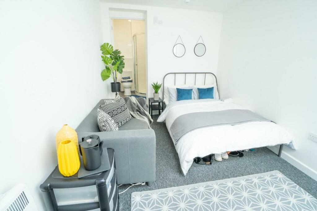 A bright and inviting double bedroom featuring ...