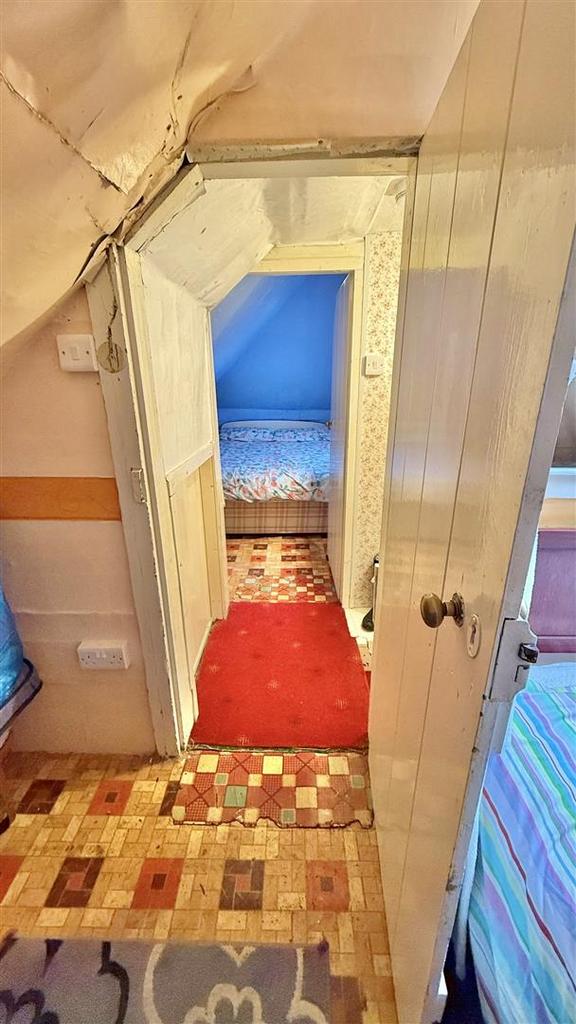Attic hallway to room 2