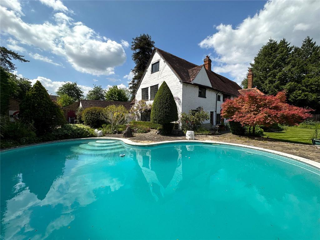 Pool and House