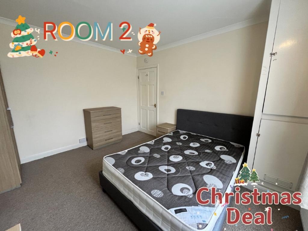 A spacious and inviting double bedroom perfect ...