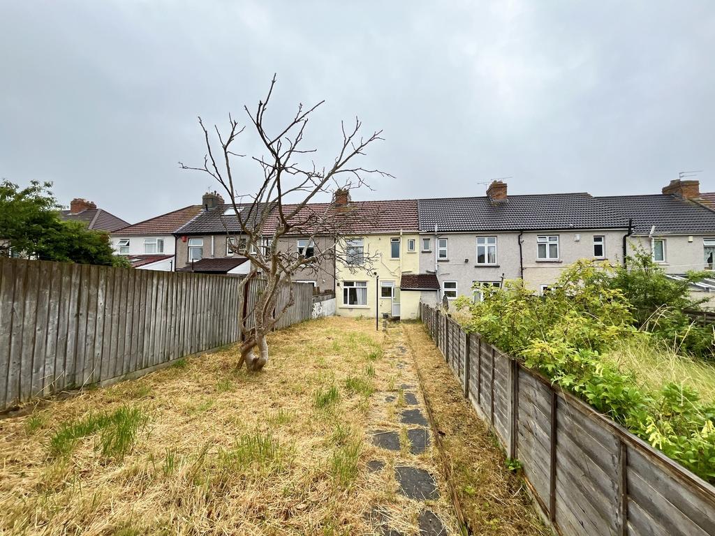 A spacious garden area with potential for outdo...