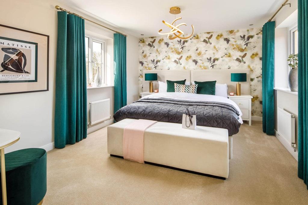 The spacious main bedroom offers a place to...