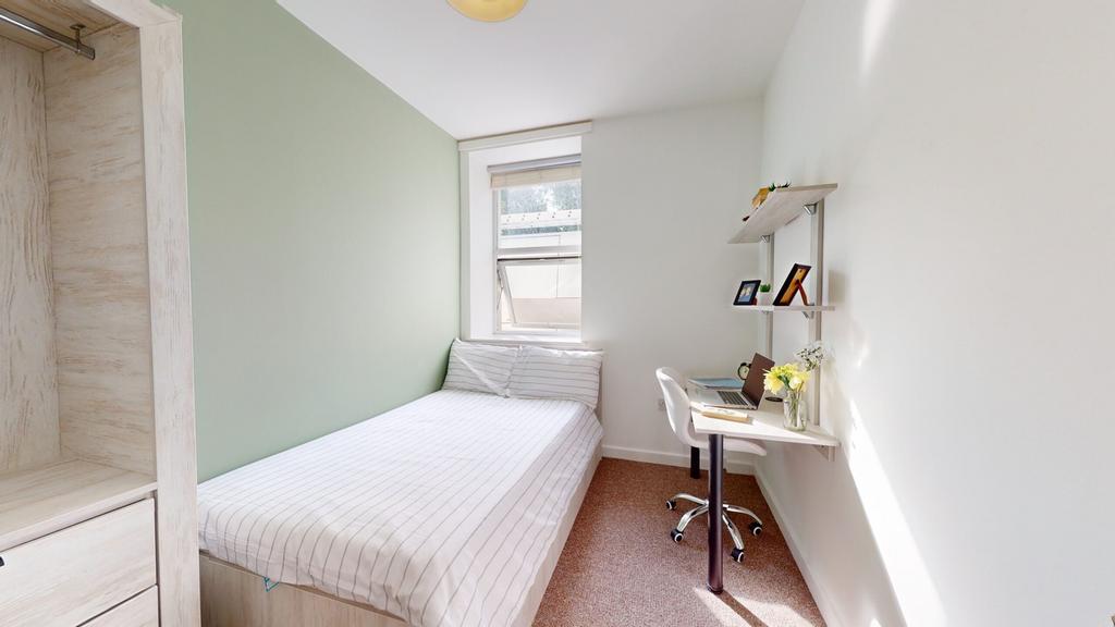 A bright and inviting double bedroom, perfect f...