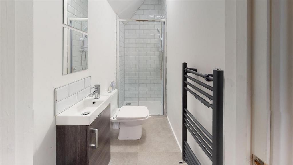 A modern and clean bathroom featuring stylish f...