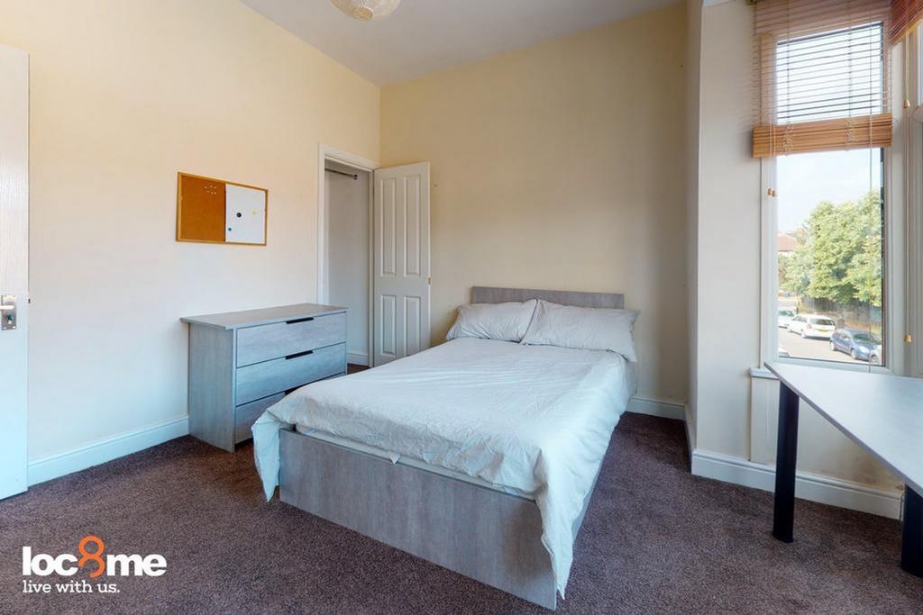 A bright and inviting double bedroom, perfect f...