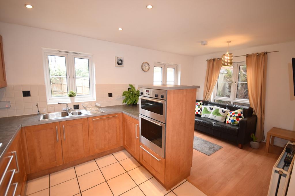 A bright and inviting kitchen with modern appli...