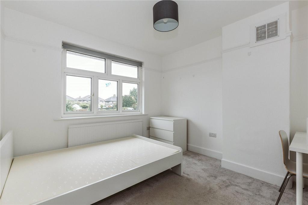 A bright and tidy double bedroom with ample nat...