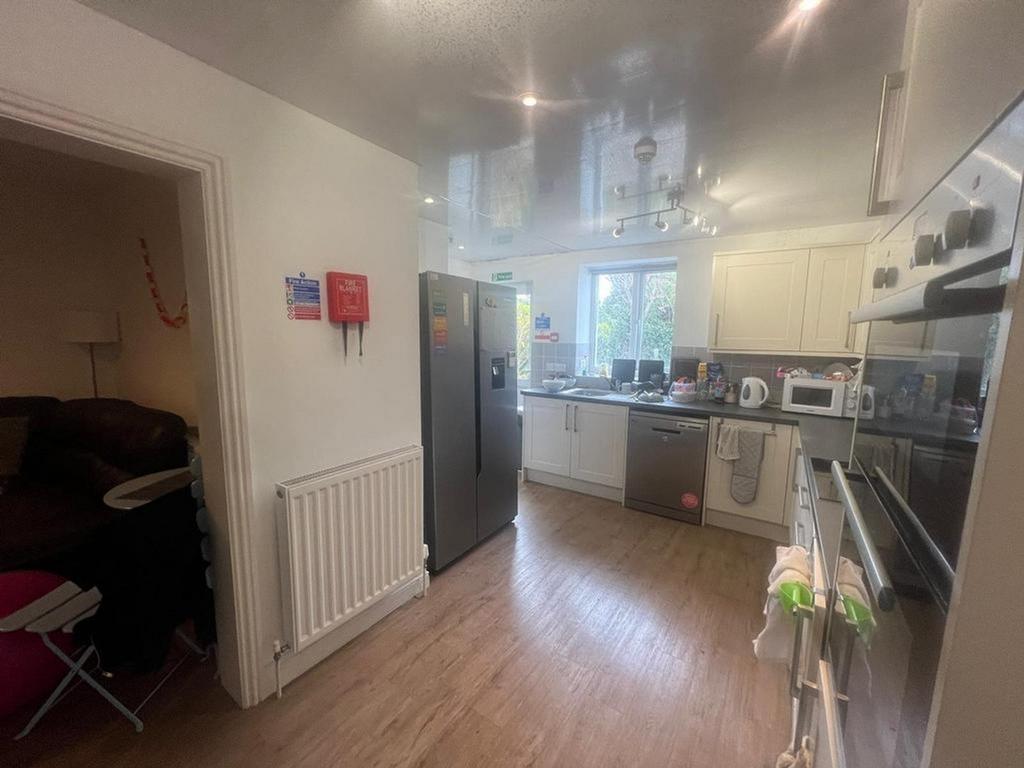 A bright and tidy kitchen area, perfect for stu...