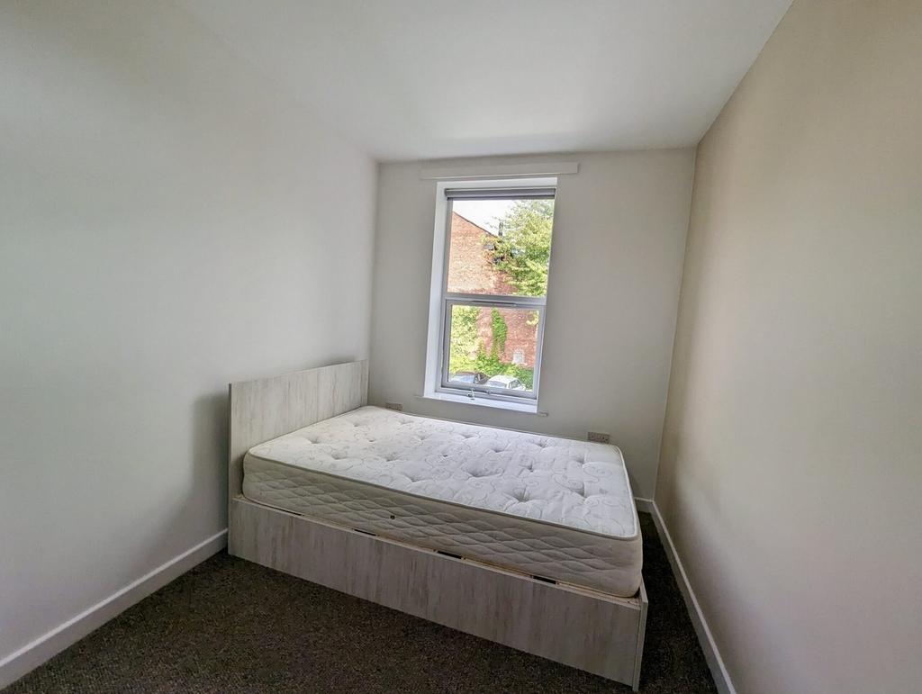 A bright and spacious double bedroom, perfect f...