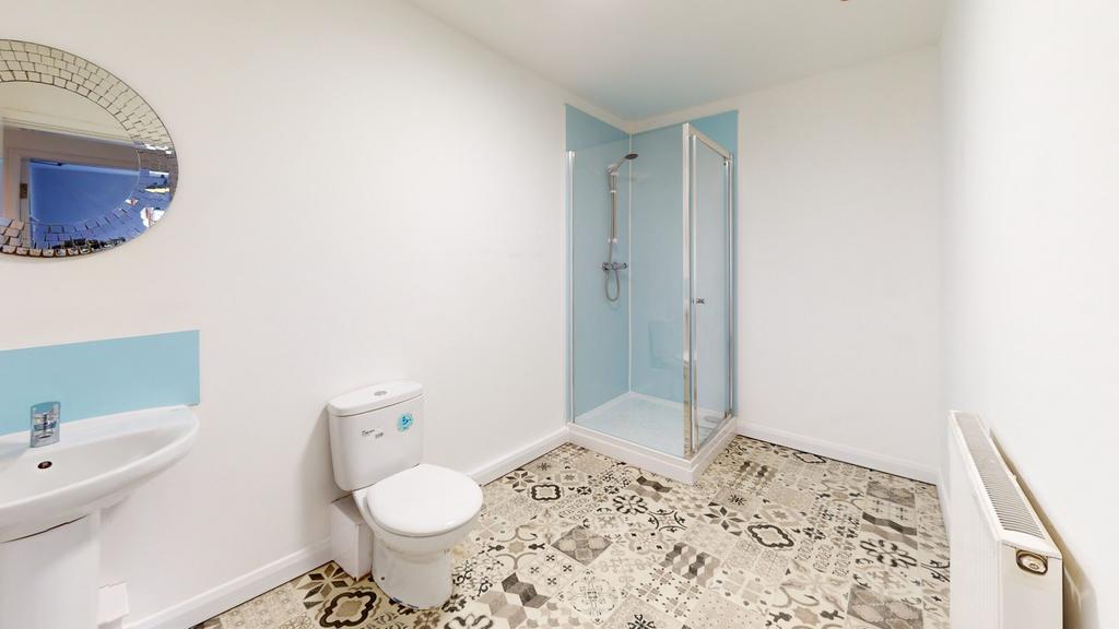 A bright and modern bathroom featuring a stylis...