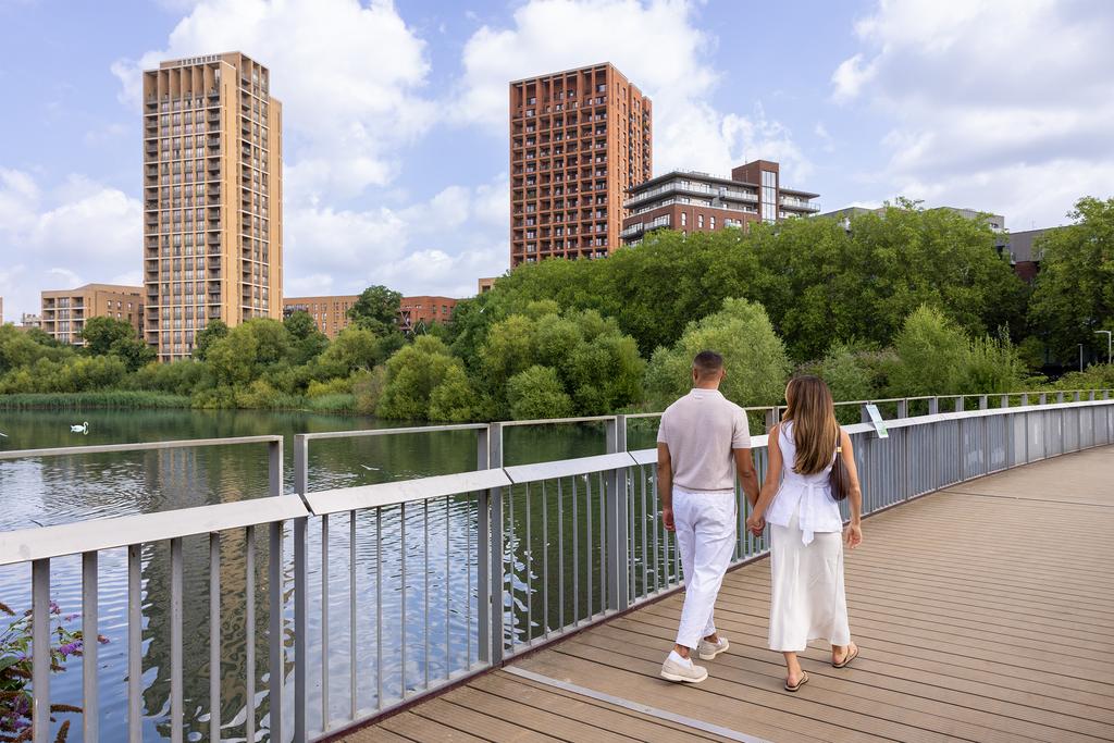 Couple walking across the bridge