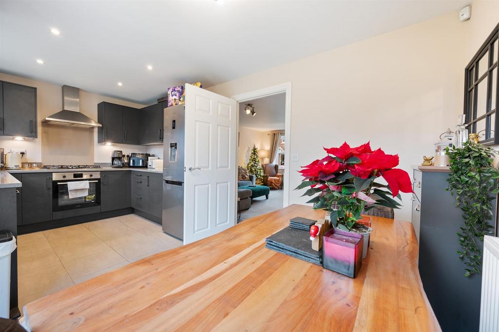 Dining area to kitchen and sitting room.jpg