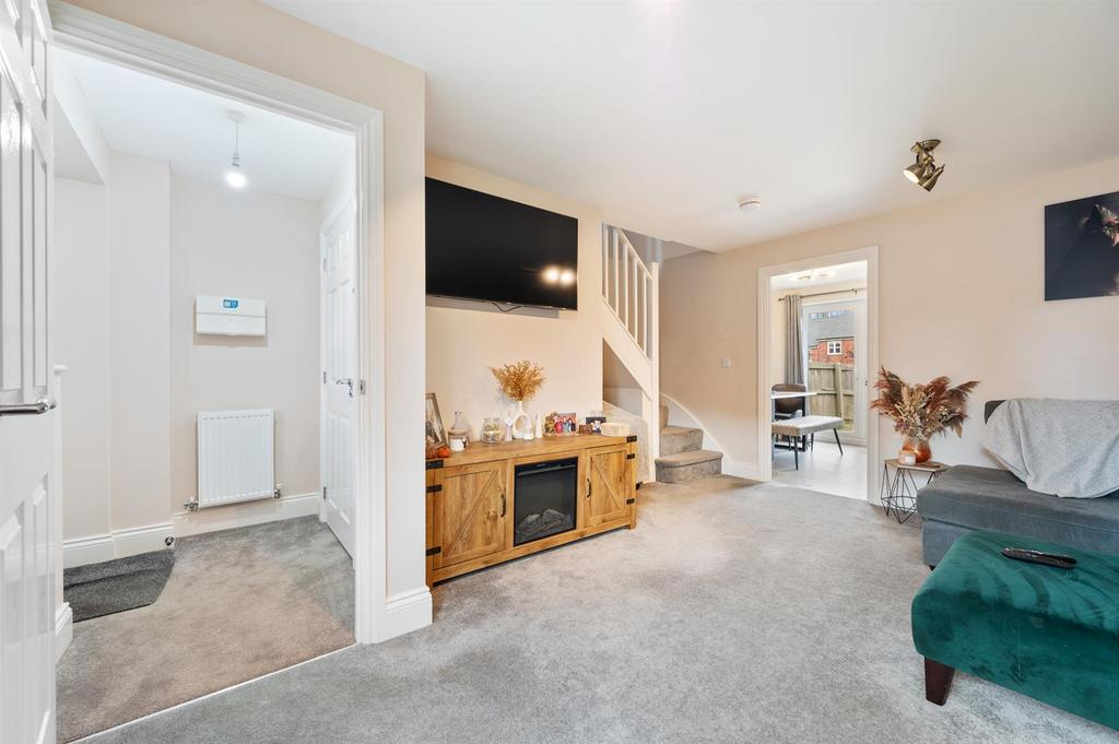 Sitting Room to entrance porch and kitchen-diner.j