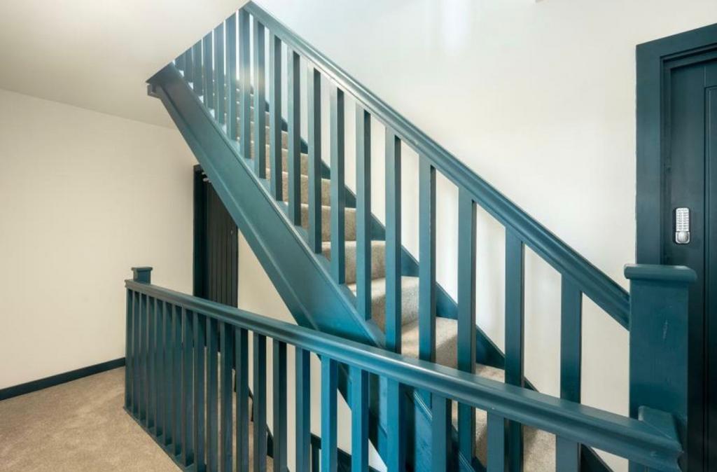 A well maintained staircase with modern design,...